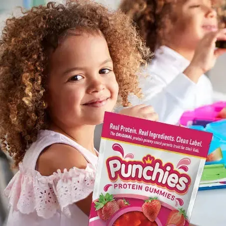 Gourmet protein gummies: a smiling girl with a bag of Punchies protein gummies